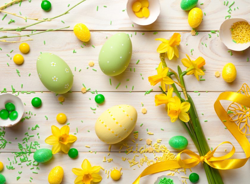 Easter Background with Easter Eggs and Spring Flowers